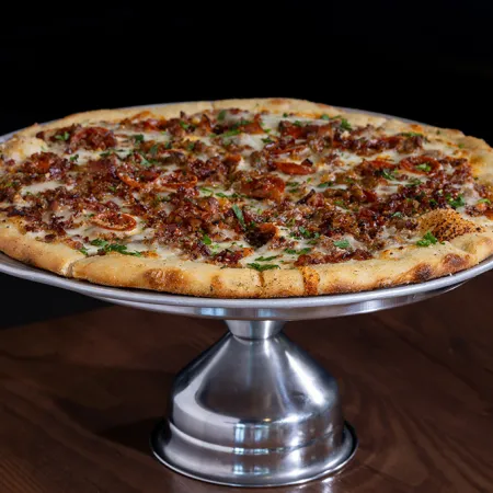 An image of a gourmet pizza from Props Pizza in the Food Hall at Evermore Orlando Resort.