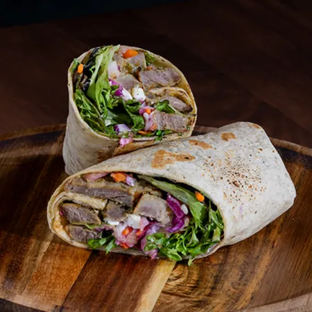 An image of a gourmet wrap from That's A Wrap! in the Food Hall at Evermore Orlando Resort.